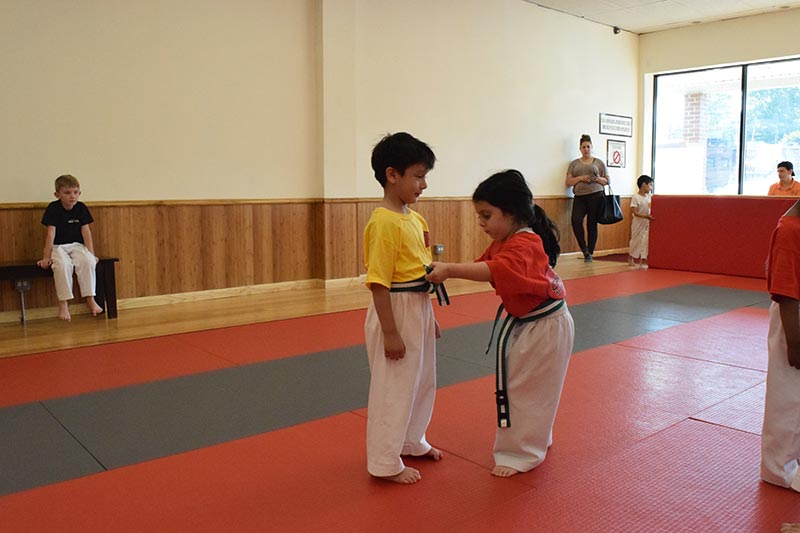 True ChampionZ Karate Kids Helping Each other